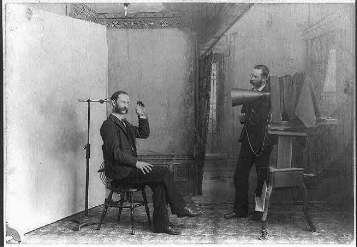 "Man Being Posed For A Photo Using A Clamp, 1892, Berlin"