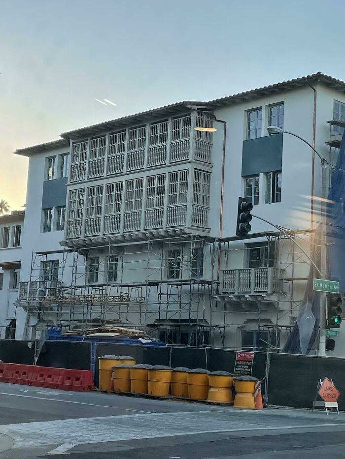 28. High-end apartments designed in the architectural style of Spanish Colonial Revival with elements reminiscent of a prison design.