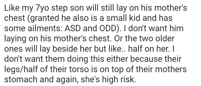 He thinks because they will occasionally lay on her chest or across her body in general that they're going to hurt her