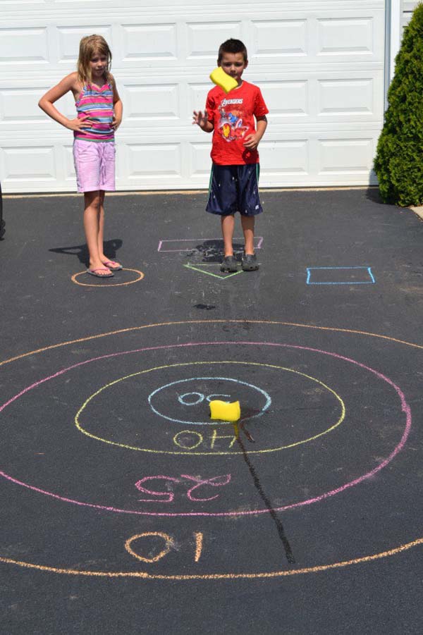 3. You can turn your driveway into a fun target game by using chalk and sponges