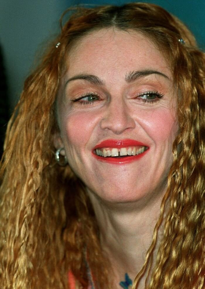 4. The space between Madonna's two front teeth has always been there.