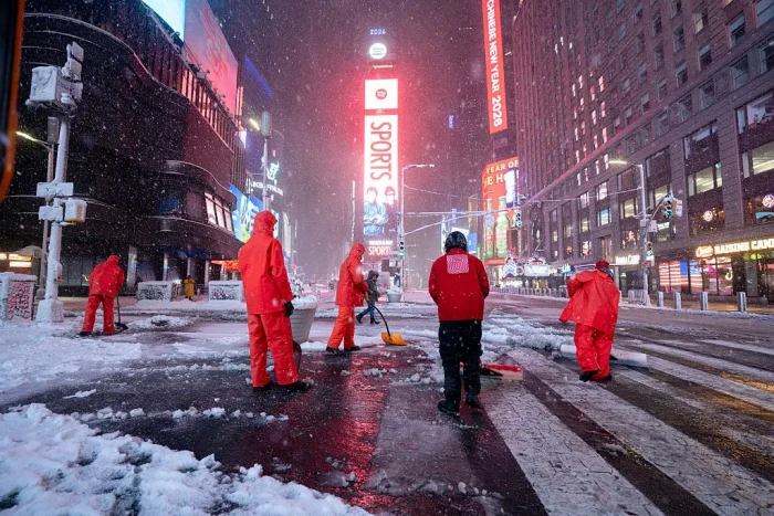 NYC emergency workers and resources mobilized during blizzard travel restriction alert.