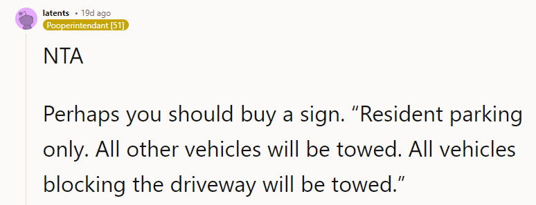 She is being aggressive, telling you it's aggressive. Go get the sign and have the tow truck number in your contacts.