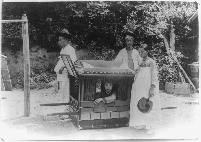 "A Korean Lady Prepares To Be Carried Through The Streets In Her Sedan Chair, 1890-1923"