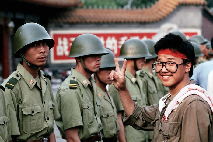 "A Student Protester Gives The V For Victory Sign In Front Of Chinese Soldiers Of The Pla. Tiananmen Square, 1 June 1989. Photo Taken By Peter "