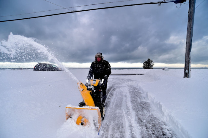 Storm clouds over Great Lakes region, jet stream dip fueling lake effect snow