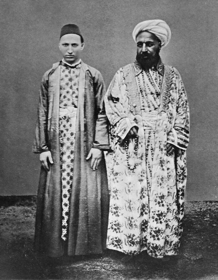 A Meccan merchant photographed with a Circassian enslaved woman in Mecca, captured sometime between 1887 and 1888.
