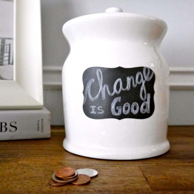 20. Chalkboard paint enhances thrifted jars creatively.