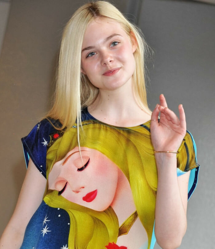 14. She was spotted with a dress featuring Aurora in a Japanese airport