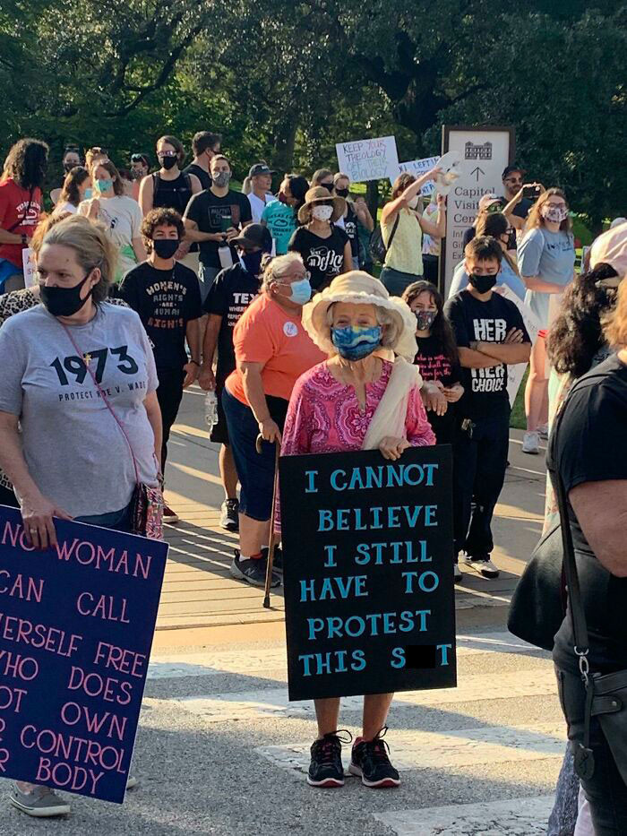12. Elderly Woman At The Women’s March In Texas