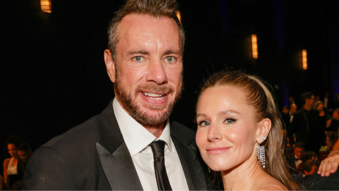 Dax Shepard and Kristen Bell with candid expressions, discussing admiration versus fandom