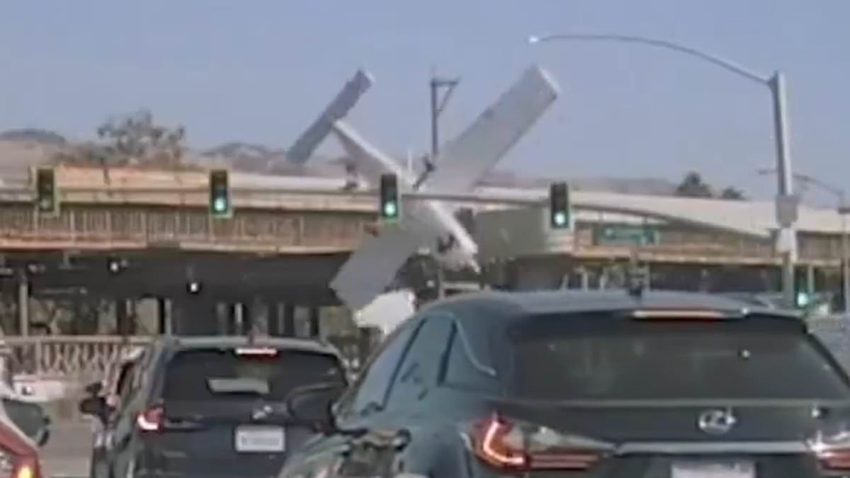 Small plane ended up standing nose-down on a busy overpass after clipping a lamppost in San Jose
