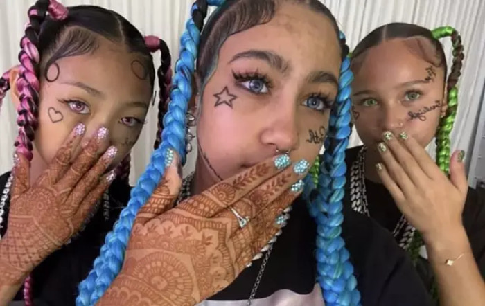 North West's Instagram account, managed by her parents, has sparked conversation about her face-covering habit