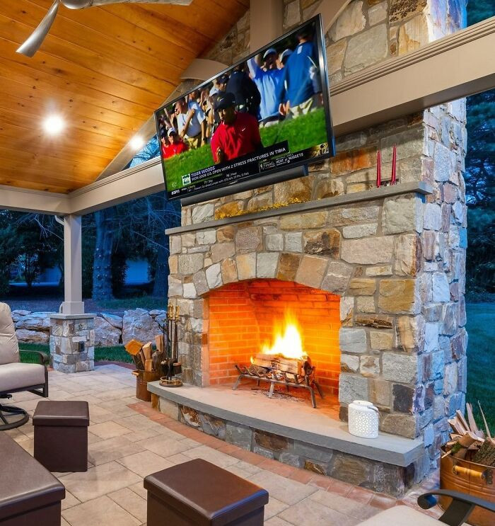 An outdoor fireplace to cozy up around.