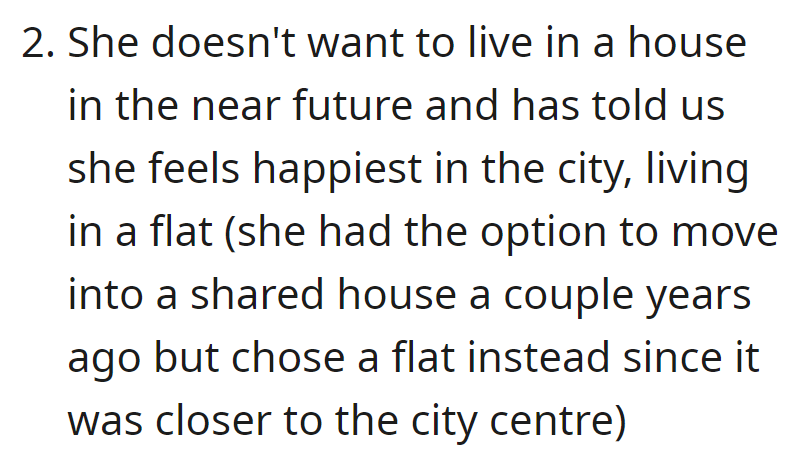 Chrissy prefers city living in a flat over a house, expressing happiness in that environment.