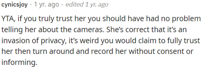 If OP genuinely trusts her, there shouldn't have been any issue with disclosing the presence of cameras.