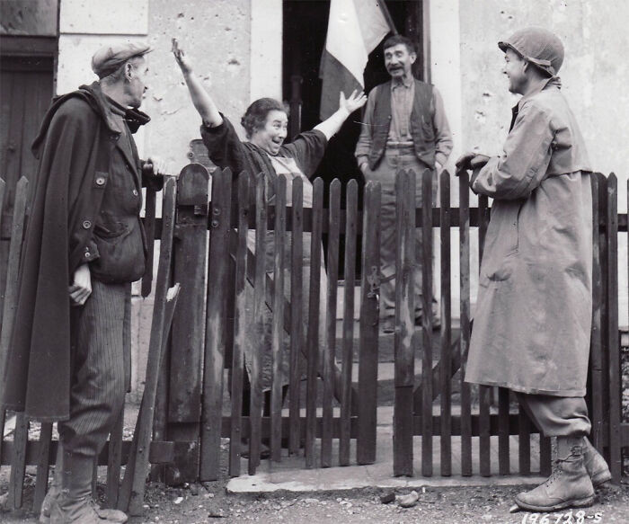 "A French Women Welcomes An American Soldier Two Days After Liberation. Strasbourg, France, 22 November 1944"