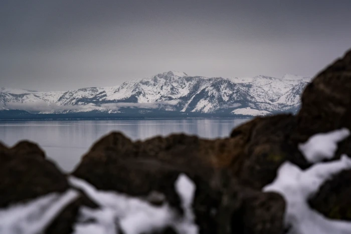 Community members gather for a candlelight vigil honoring avalanche victims