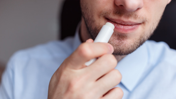 Medical infographic style view of chapped lips, allergy and winter weather causes