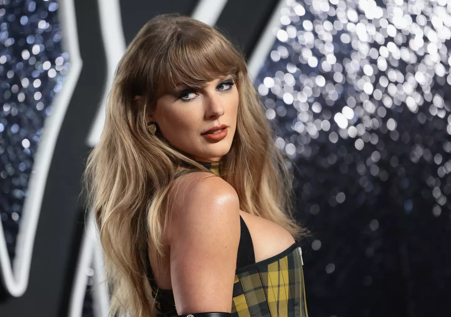 Taylor's hurricane relief donation sparks both praise and controversy.
