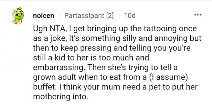 She's trying to tell an adult when to eat