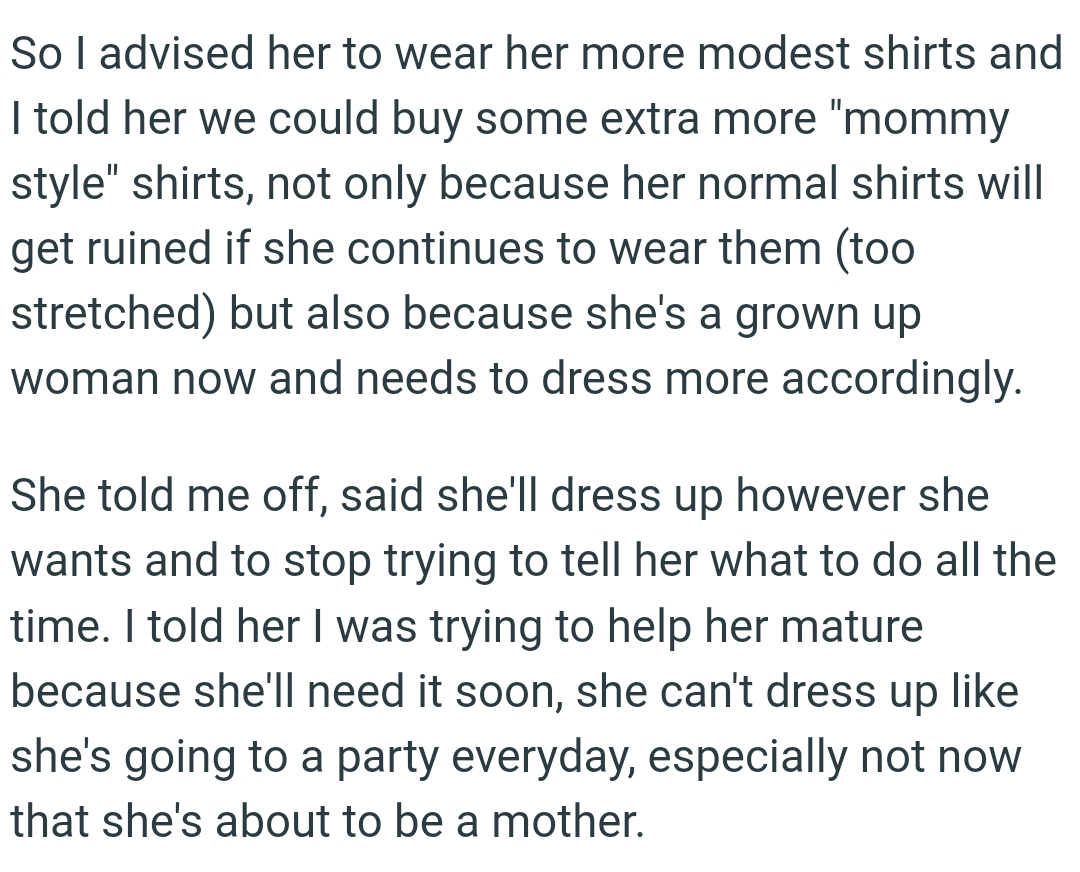 She wears tank tops or shirts that show her cleavage