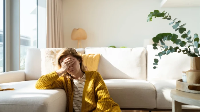 Bedroom morning light through curtains, illustrating wakefulness with natural light exposure