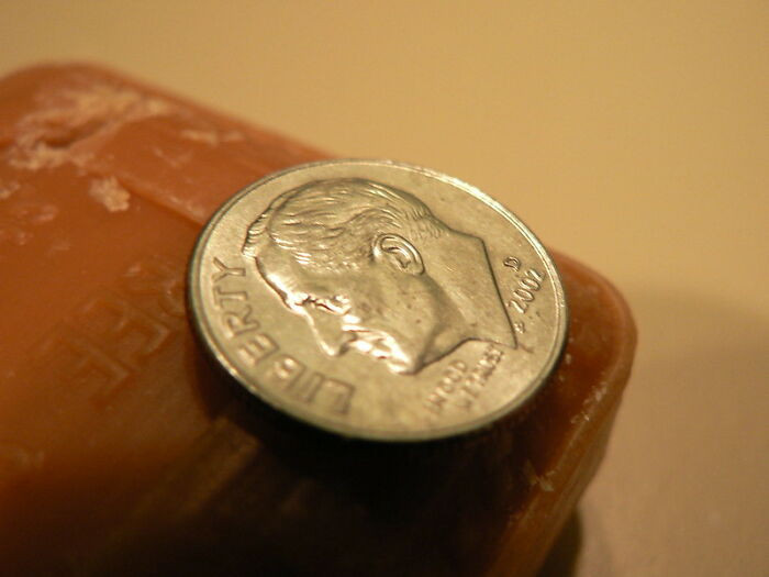 12. Love blossomed from a flicked dime to a scar; now married with three kids