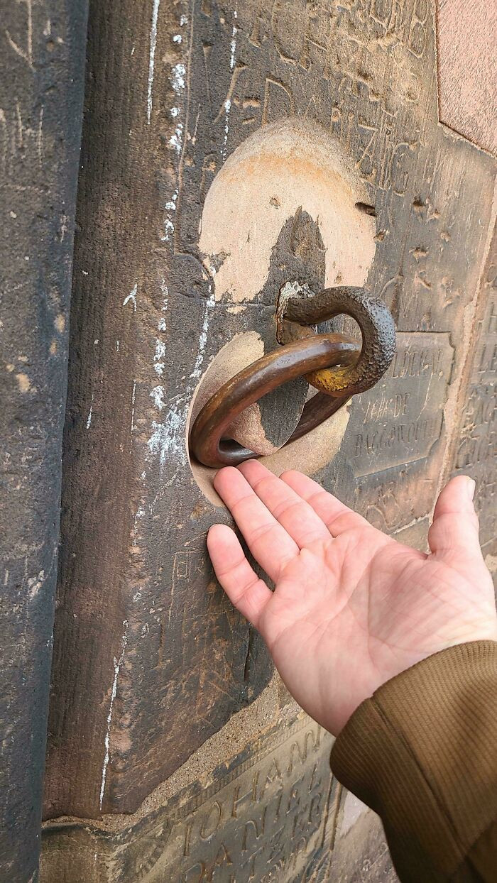 "Metal Ring Wearing Into The Sandstone Of The Cathedral In Strasbourg, France"