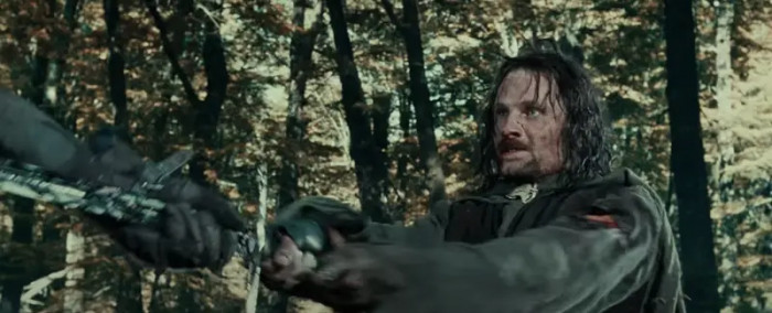 17. Aragorn cutting off the huge Uruk-Hai's head in The Lord of The Rings: The Fellowship of the Ring