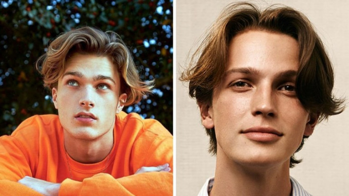 12. The short curtain style is a popular '80s hairstyle for men.