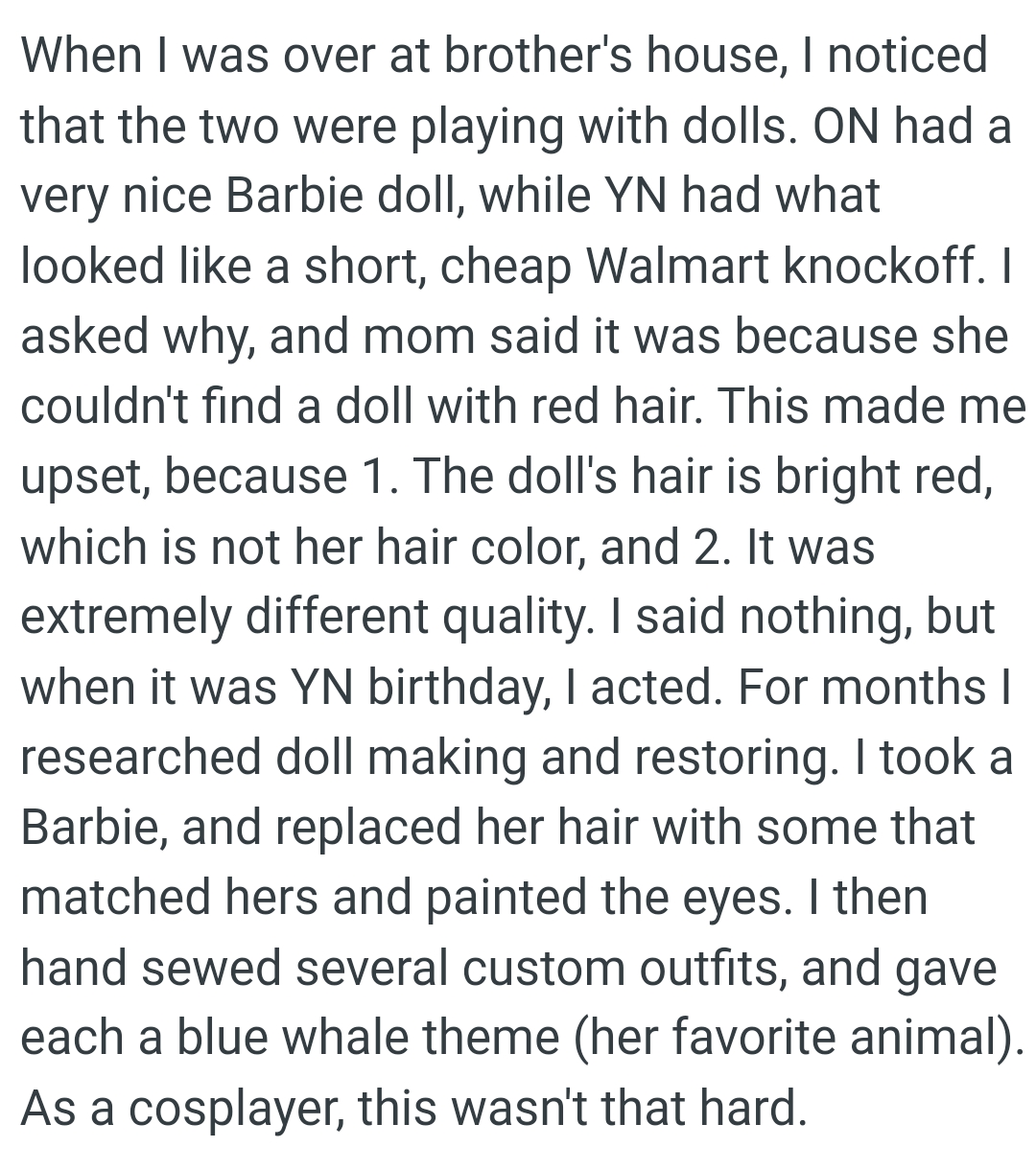 The doll's hair is bright red, which is not her hair color