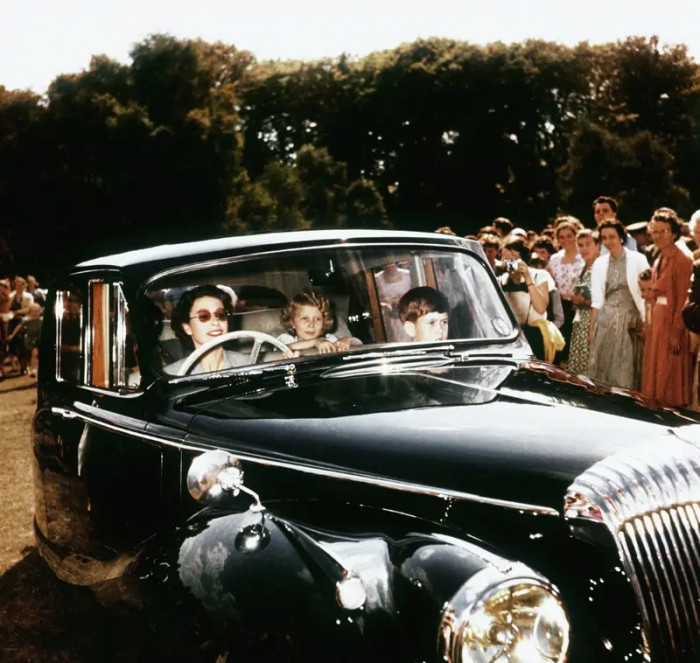 20. Taking a drive with Prince Charles and Princess Anne