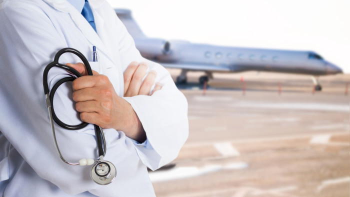 Mortuary staff coordinating deceased passenger repatriation with airline and insurance teams