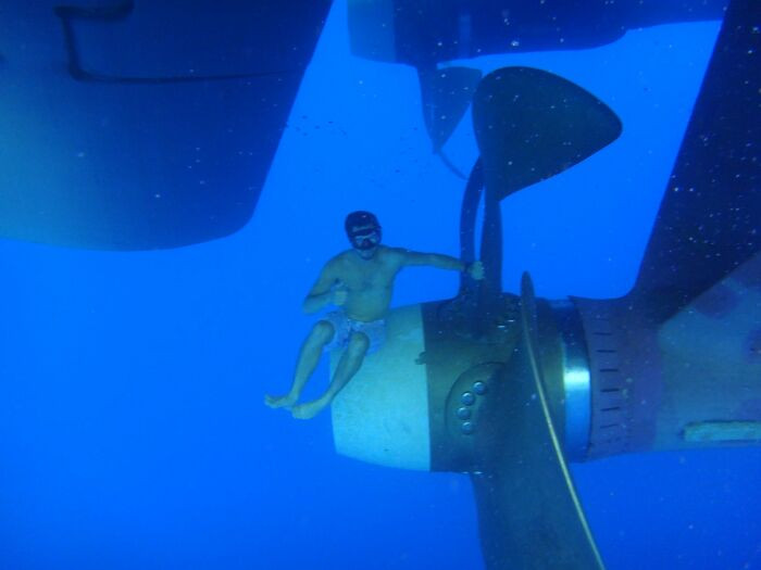 "Hands To Bathe - With A Twist. Diver Recreationally Dives On HMNZS Te Mana While She Is Moored Off Western Australia"