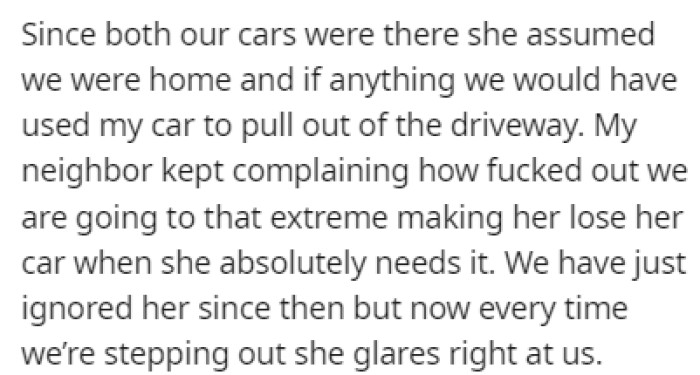 The neighbor believes that having her car towed was an overreaction from OP