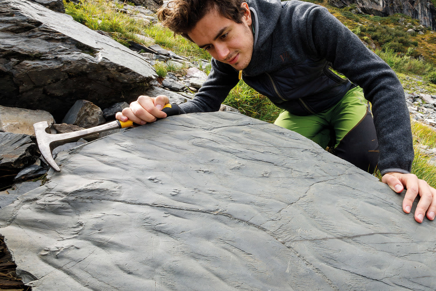 Marco Cattaneo is taking a closer look at Boulder 0. This unassuming slab of rock was the first to whisper secrets from a world long gone