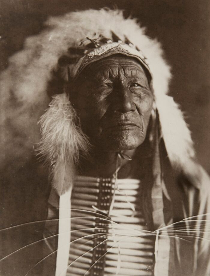 Native American in Headdress, C. 1910