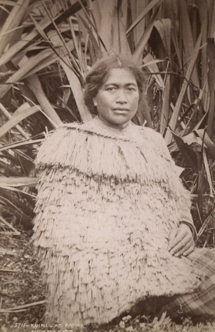 Maori Woman Wearing The Traditional Costume Made Of Flax Fibre