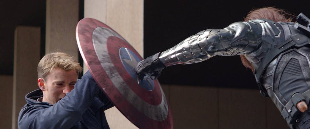 The iconic fight scene from 'Captain America: The Winter Soldier' features Chris Evans as Captain America and Sebastian Stan as the Winter Soldier, battling it out in the middle of a highway.