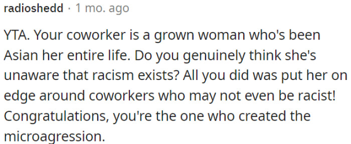 OP's coworker is fully aware of racism, and OP has needlessly made her uncomfortable around colleagues who may not be racist.