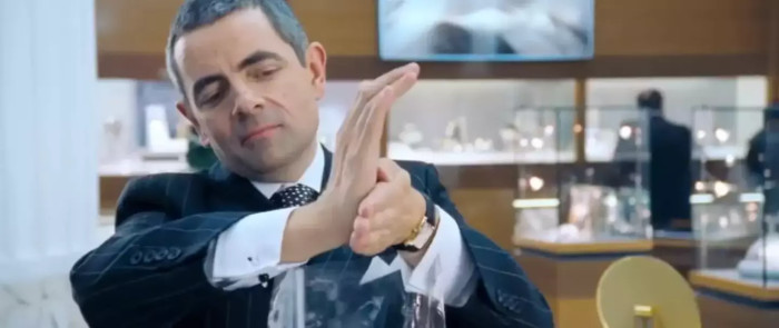 In the famous Love Actually sequence, Rowan Atkinson's character Rufus took a long time to wrap the necklace