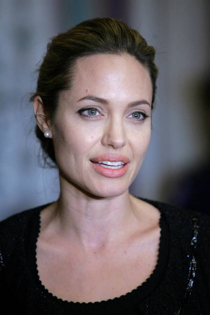 14. Angelina Jolie tried to hire a hitman to kill her when she was 22, but he convinced her to stay alive.