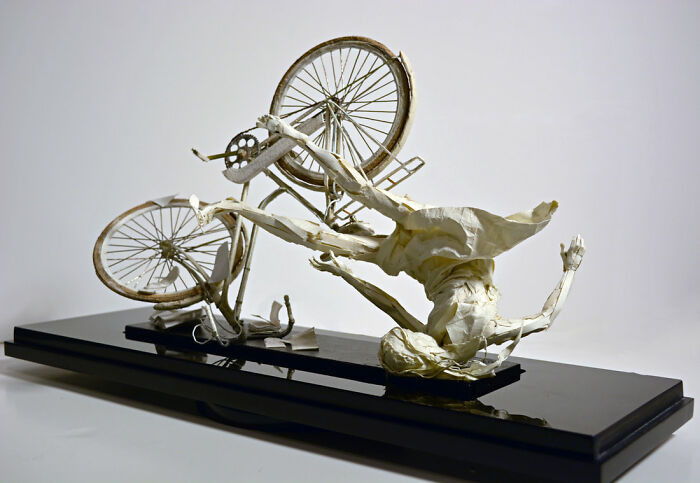 Artwork titled The Road To Agra, delicate folded sheet sculpture resembling a traveler