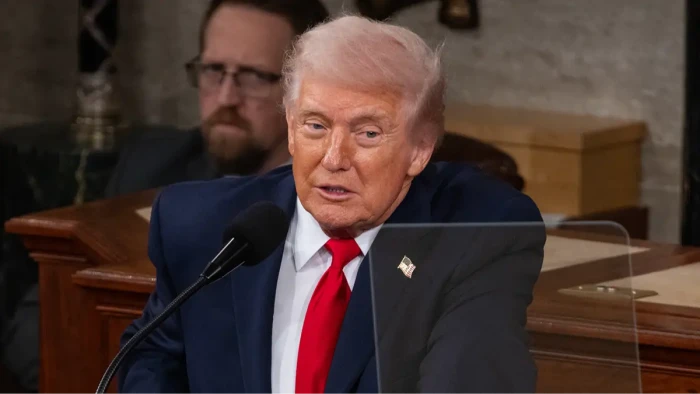 Protesters and community members gather in grief, calling for safety and justice.