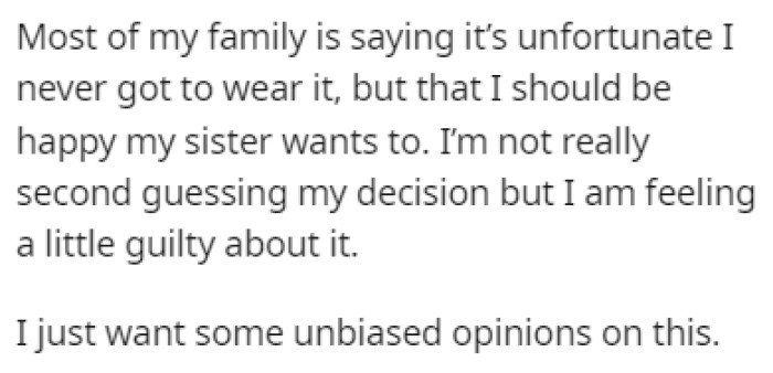 Most of OP's family thinks that she should give her sister the dress since she never got to wear it
