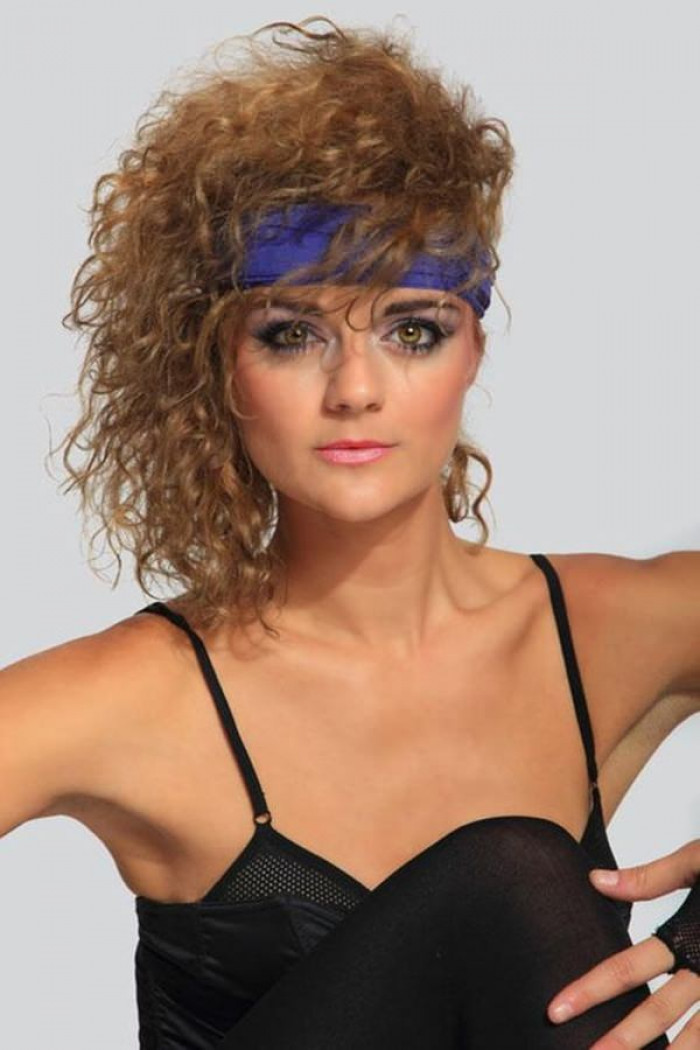 9. Side Part was a big style in the ’80s and made one look like they were on the way to the gym, mainly because of these headbands
