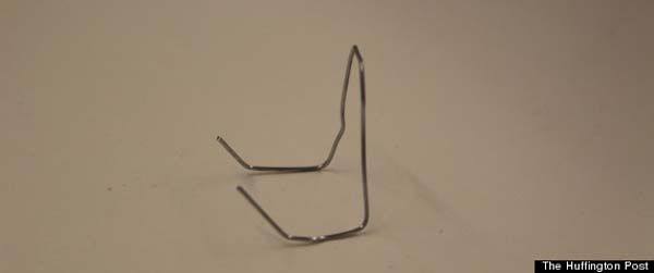 Bend each end upward.