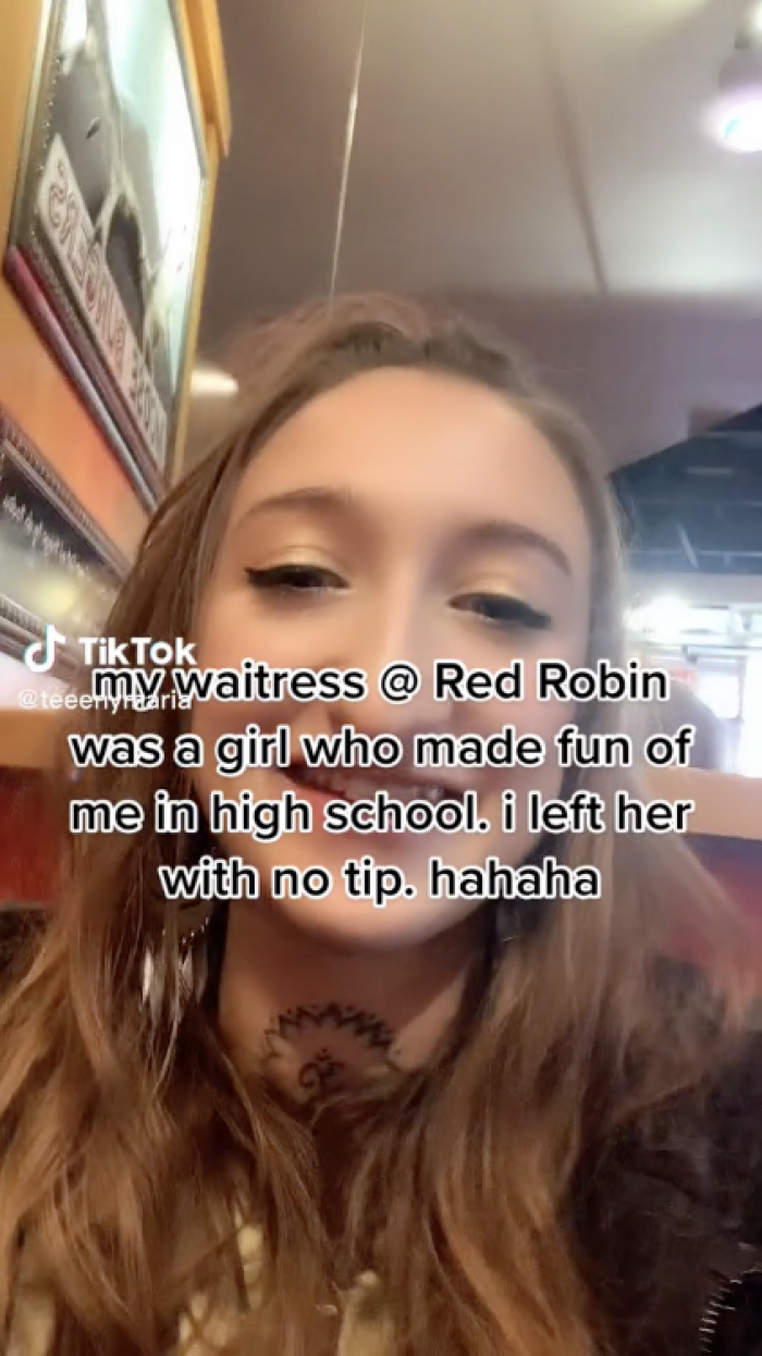 She was at Red Robin when her waitress turned out to be her high school bully who used to make fun of her.