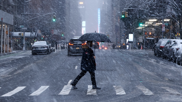 Airport snow warnings and winter storm impacts on urban infrastructure and safety